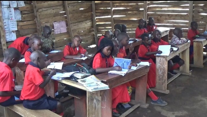 Students in a classroom at Shalom Primary school Luweero
