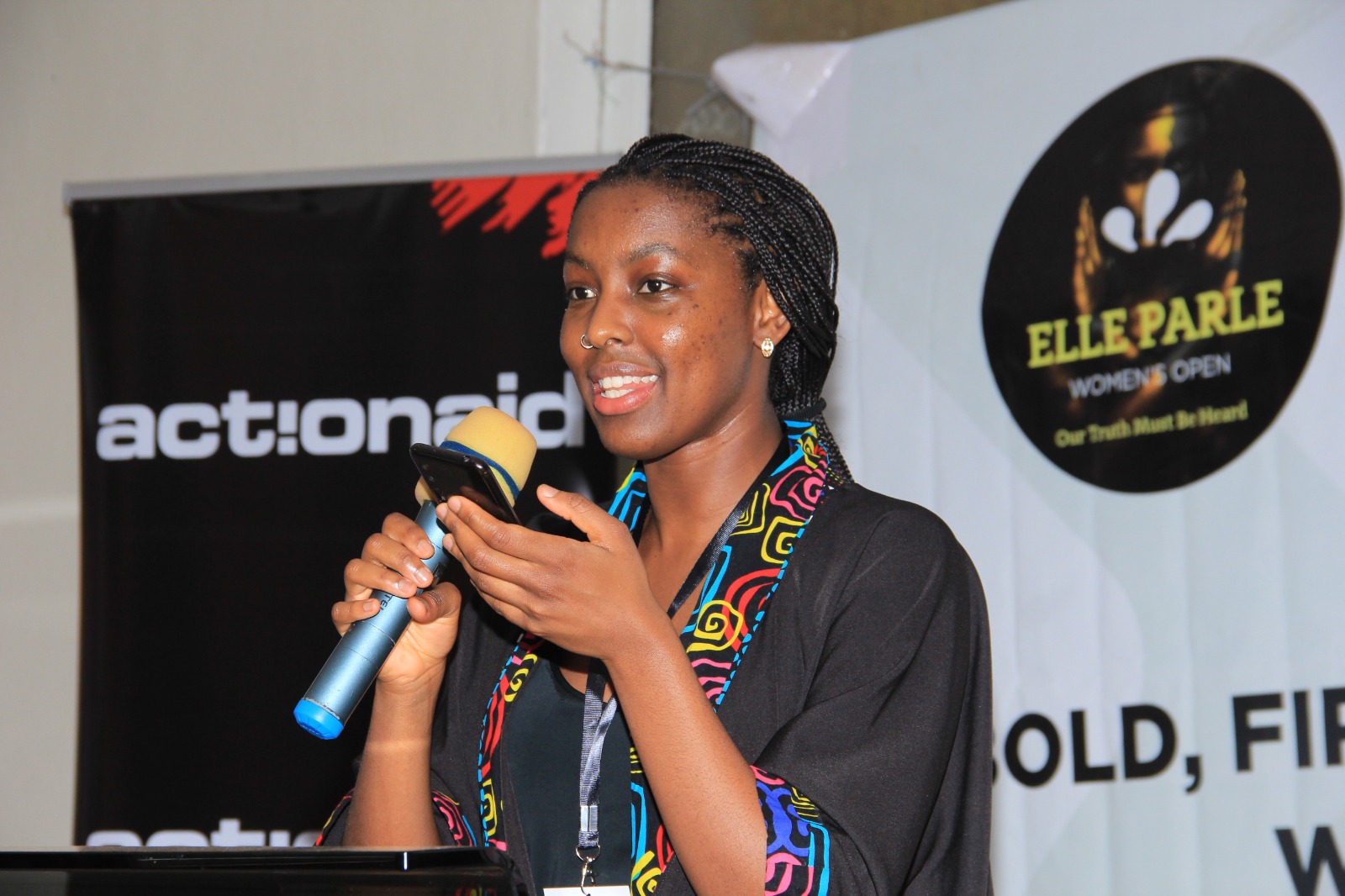 chief adjudicator Chantelle Mukabi speaking to the debaters